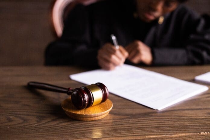 THREE SUSPECTS IN COURT FOR MURDER