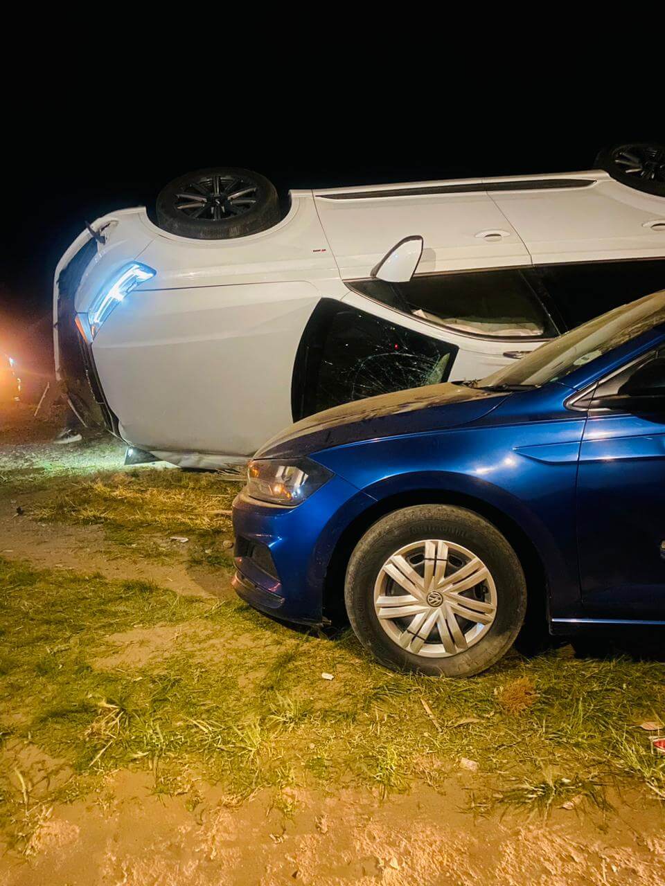 White Audi Q7 crashed over a sports blue Polo that was parked by Melodi tavern at Zikhuba