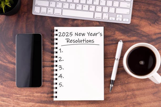 New Year's Resolutions 2025 Text On Note Pad Stock Photo Flat Lay New Year, New You: Unlock the Power of Goal Setting